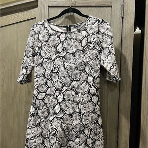 Express snake print office to dinner dress.